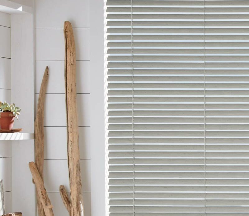 gray composite blinds in primary bathroom