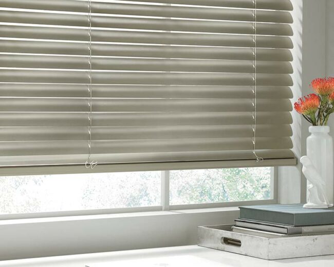 automated metal blinds in contemporary home office space