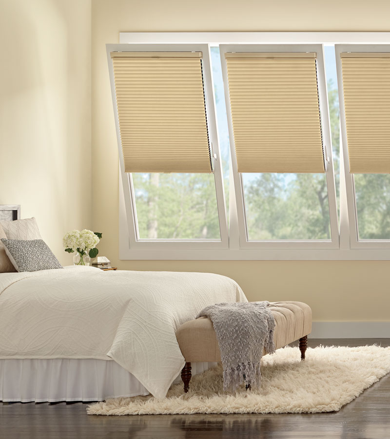 open windows angled in as european style windows with beige shades that cover tilt turn windows