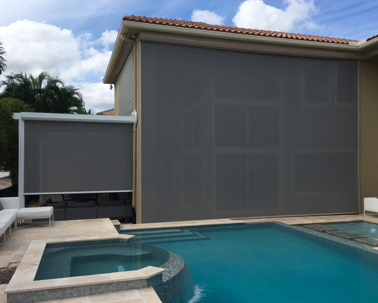 large black exterior screen shades on pool house