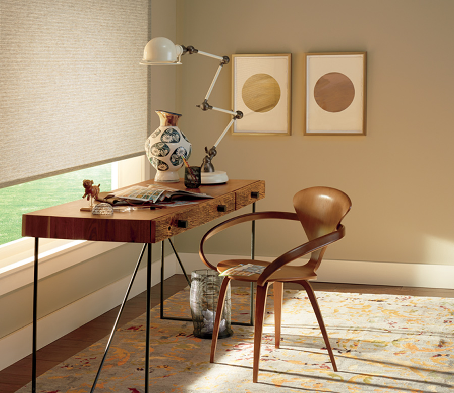 home office with roller shades and rustic wood desk Omaha