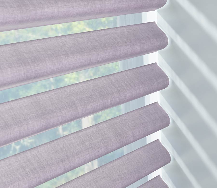 up close shot of window shade in eggplant color