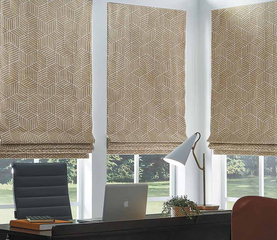 gold and white fabric custom roman shades with geometric pattern in Omaha home office