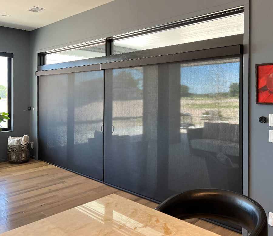 black shades on sliding glass door to patio area in omaha, ne home