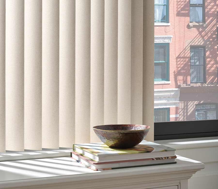 cream vertical blinds in high rise building downtown city area